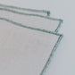 Contrast-edge linen napkin, Aerende - Plum & Belle