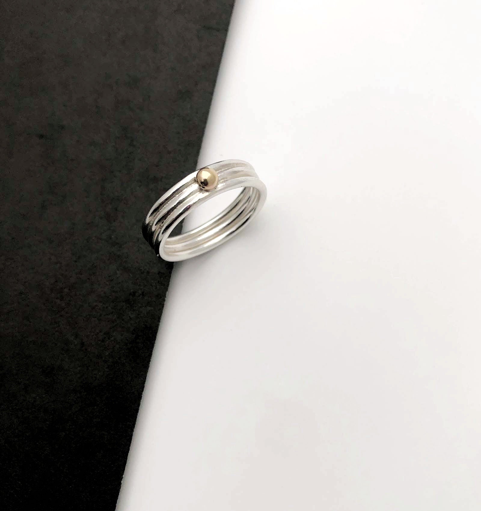 'Neo Deco' triple silver band with 9ct gold bead - Plum & Belle